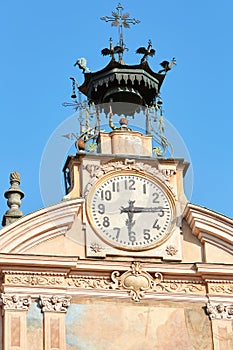 Mondovi, Saint Peter and Paul church clock and bell tower with automaton in a sunny day in Italy