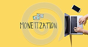 Monetization with person working with laptop