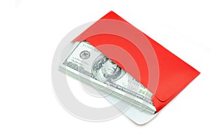 Money 100 Us dollar bills in a red envelope at white background