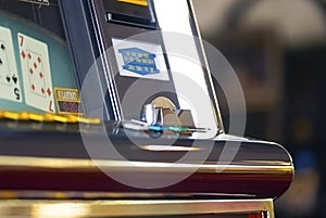 Money acceptor on a slot machine... photo