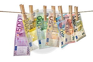 Money background Euro banknotes hanging clothes pins