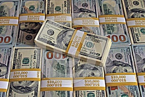 $100 dollar bills stacks - cash stacks on the table
