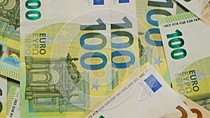 Money background. Two hundred and one hundred banknotes. Euro banknotes background.Finance and savings.