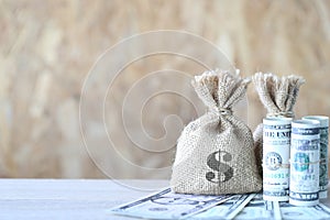 Money bag with banknote on wooden background, Saving for prepare
