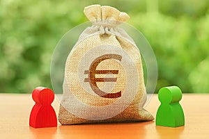 Money bag with Euro symbol and two people figures. Investment and lending, leasing. Dispute solution between two businessmen