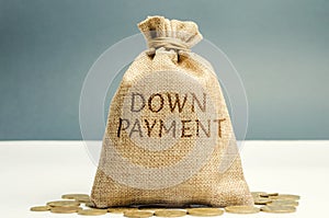 Money bag with the word down payment. Payment used in the context of the purchase of expensive items such as a car and a house,