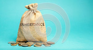 Money bag with the word Inheritance. Separation of inheritance between relatives or transfer of property to charitable photo