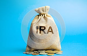 Money bag with the word IRA - individual retirement account. Tax-advantaged account that individuals use to save and invest for