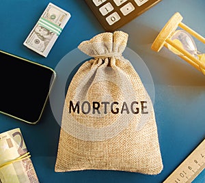 Money bag with the word Mortgage. Mortgage rates concept. Loan and credit. Interest payment. Business and finance. Real estate,