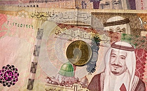 Money, banknote and coin of Saudi Arabia Riyals in shallow focus