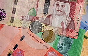Money, Banknote of Ringgit Malaysia, Singapore dollar and Saudi Arabia Riyals