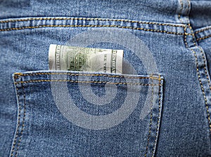 Money, banknotes in a jeans pocket, close up.