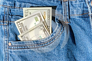 Money in blue jeans pocket