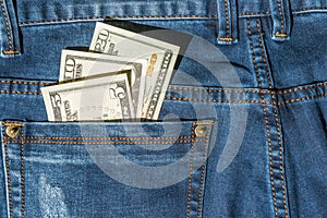 Money in blue jeans pocket