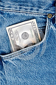 Money in blue jeans pocket