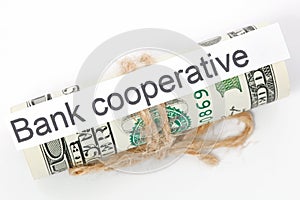 Money and business idea, The dollar bills tied with a rope, with a sign - Bank cooperative.