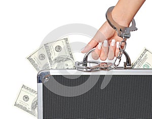 Money, case of dollars bills in female hand with handcuffs, isolated