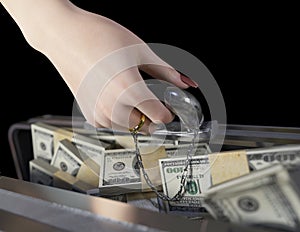 Money in case and woman hand with wedding ring marriage of convenience concept