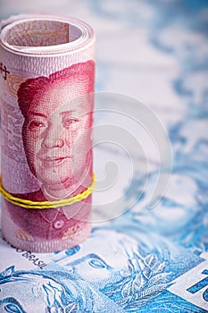 Money from china and brazil, banknotes of one hundred reais and banknotes of 100 yuan, or Renminbi. Brazil and china market