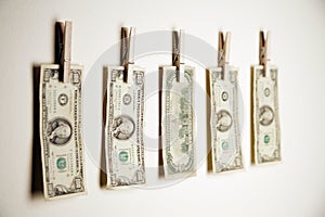 Money clipped to wall