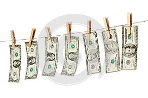 Money on clothes line isolated