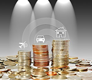 Money coin stack growing graph with icon travel car and house is
