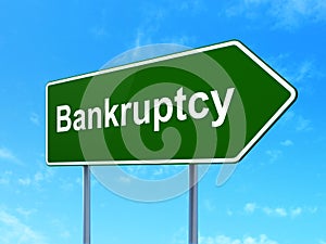 Money concept: Bankruptcy on road sign background