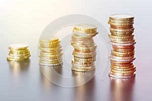 Money concept: Coins tacked on each other. Inflation, currency, savings, money