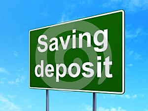 Money concept: Saving Deposit on road sign background