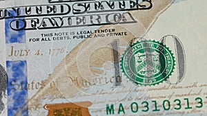 Money currency stack of hundred dollar bills on table