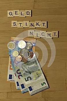 Money doesnt stink, word in german Geld stinkt nicht photo