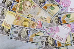 Money dollars and hryvnia, close-up top view concept finance