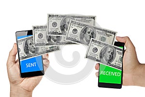 Money dollars transfer between mobiles or smartphone isolated on white. Contactless payment NFC photo
