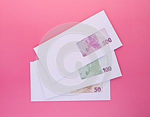 Money in envelope. Stack on closed envelopes with euro banknotes for black salary payment