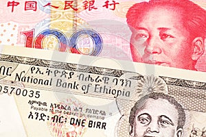 Money from Ethiopia along with money from China close up