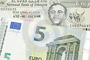 Money from Ethiopia along with money from Europe close up