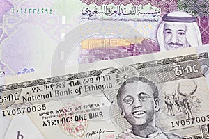 Money from Ethiopia along with money from Saudi Arabia close up