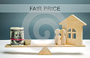Money and family with a house on the scales with the inscription Fair price. Property valuation. Home appraisal. Housing evaluator photo