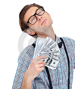 Money fan, winner and man with dollars in studio  on a white background. Male person, cash and fanning after