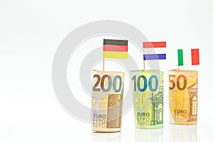 Money and flags of European countries.Flags of Germany, France and Italy euro bills on a white background.euro inflation