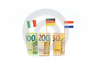 Money and flags of European countries.Flags of Germany, France and Italy euro bills on a white background.euro inflation