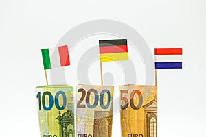 Money and flags of European countries.Flags of Germany, France and Italy euro bills on a white background.euro inflation