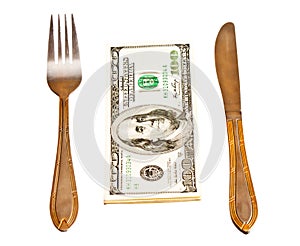 Money with fork and knife