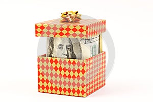 Money in gift box with gold bow