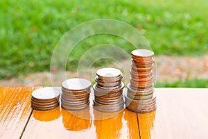 Money growing concept,Business success concept,lamp on pile of c