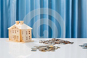 Money growth concept saving to buy house for your family.