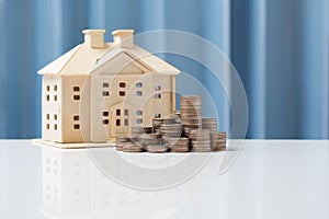 Money growth concept saving to buy house for your family.