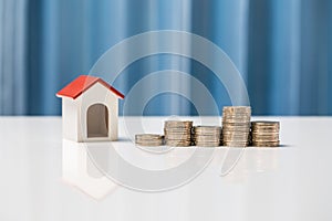Money growth concept saving to buy house for your family.