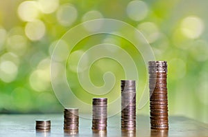 Money growth Saving money. Upper tree coins to shown concept of