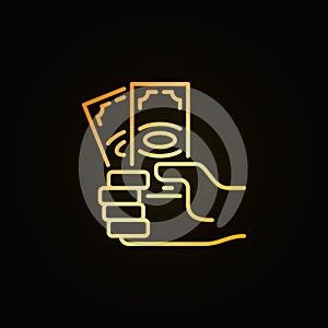 Money in hand golden icon